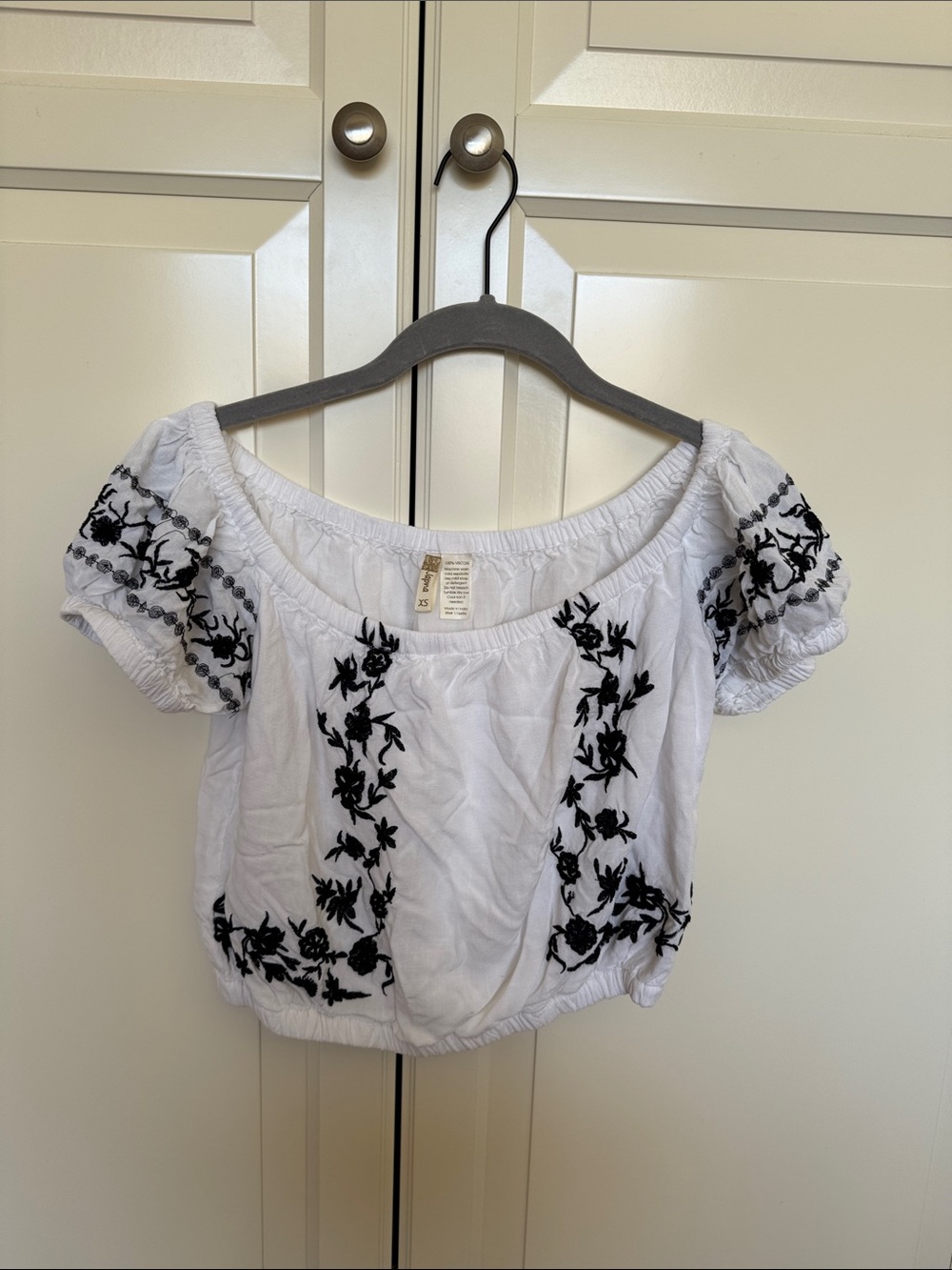 Japna White Off-Shoulder Crop Top with Black Floral Embroidery